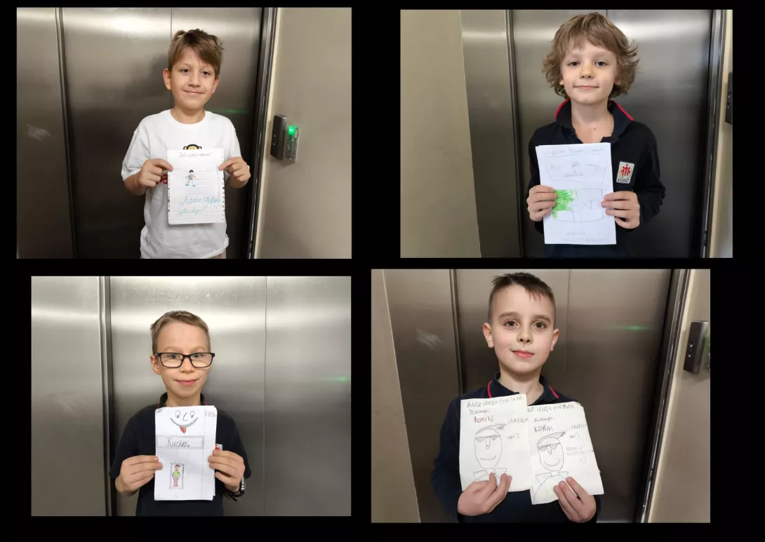 Uczniowie klasy 2b z napisanymi przez siebie książkami.
