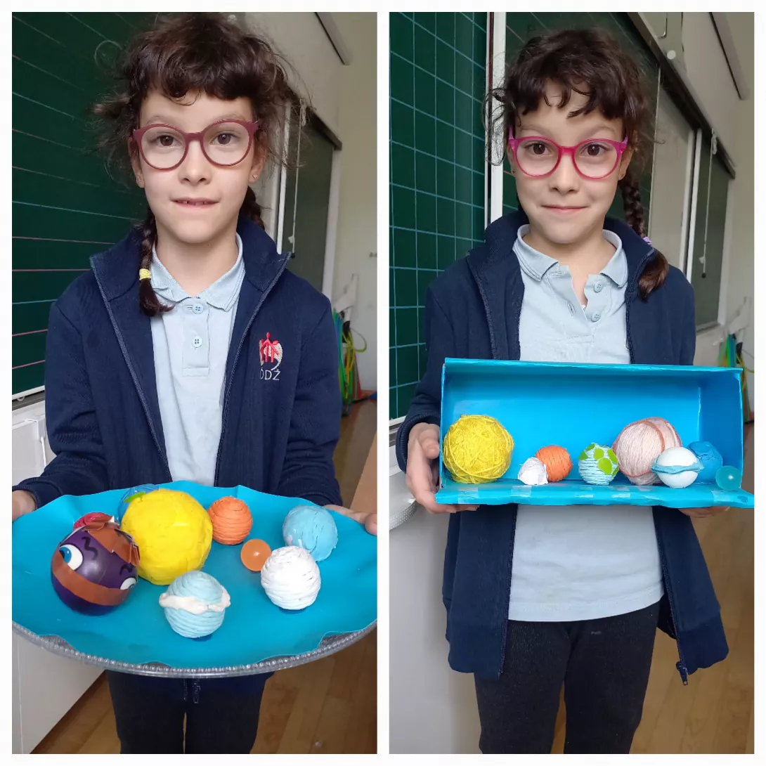 Uczennice klasy 3c prezentują swoje prace na temat Układu Słonecznego